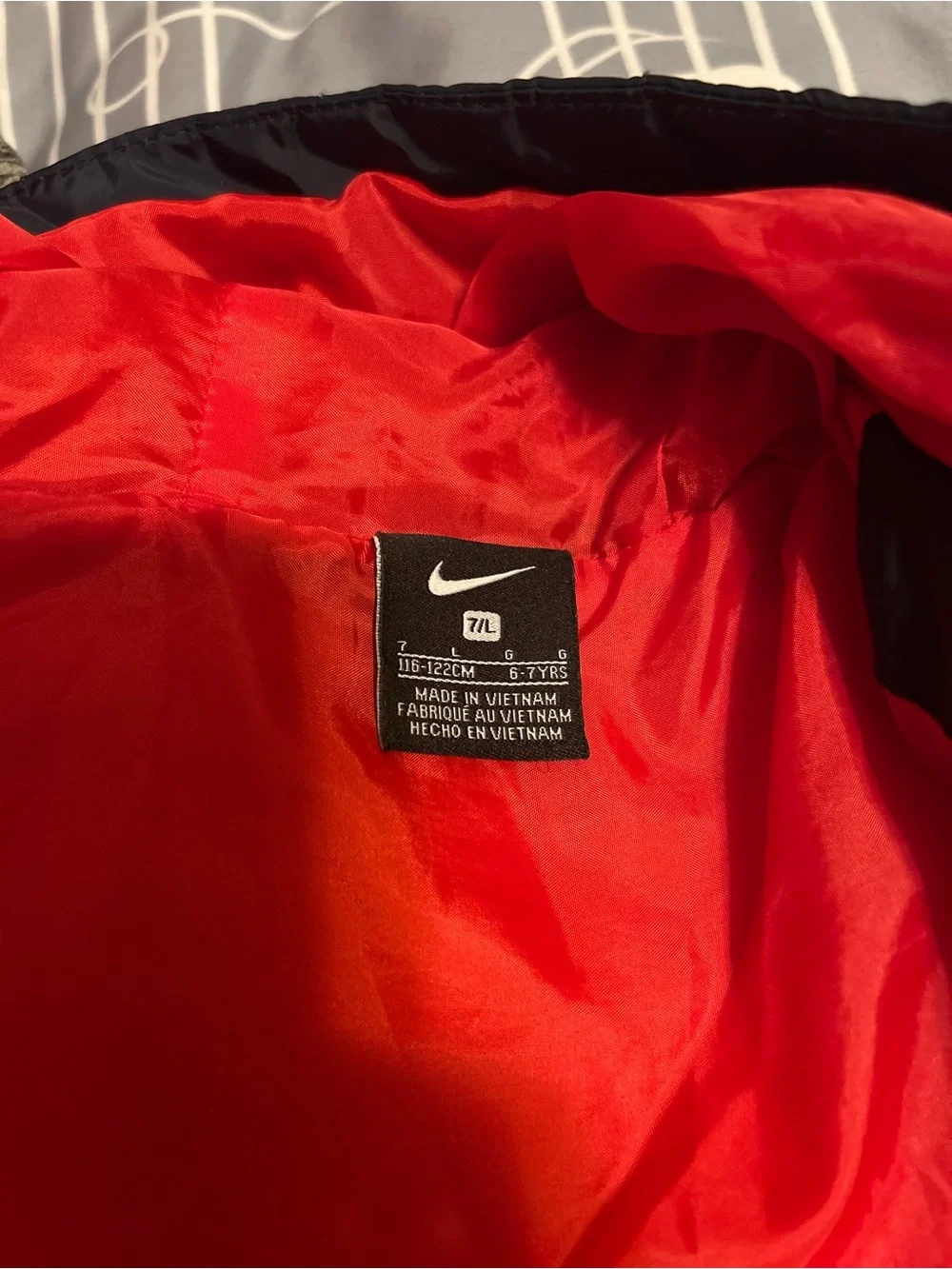 Nike Kids Navy Puffer Jacket with Red Accents